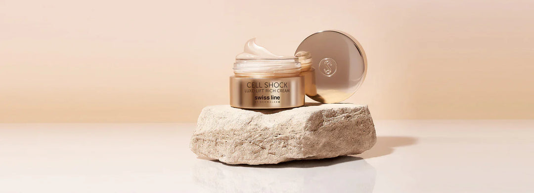 Swissline Rich Cream on a rock with beige background