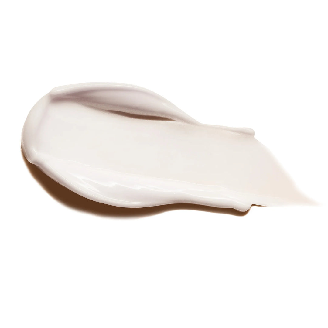 Close-up of a beige cream swatch on a white background