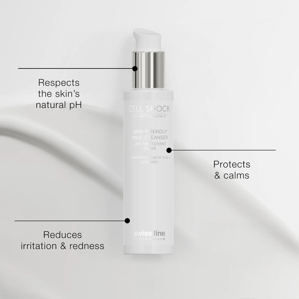 Skincare bottle with text highlighting its benefits on a gray background