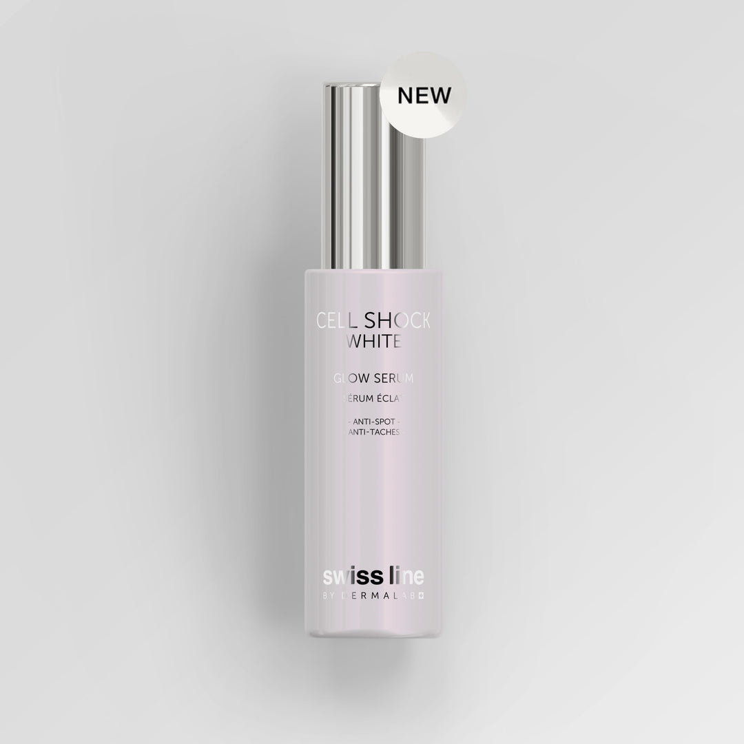 A bottle of Swiss Line Cellular Glow Serum in 'Cell Shock White' with a silver cap and a white 'NEW' sticker, set against a clean light gray background.