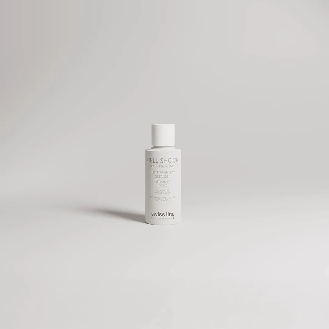 Skincare bottle labeled 'Cell Shock' on a light gray background