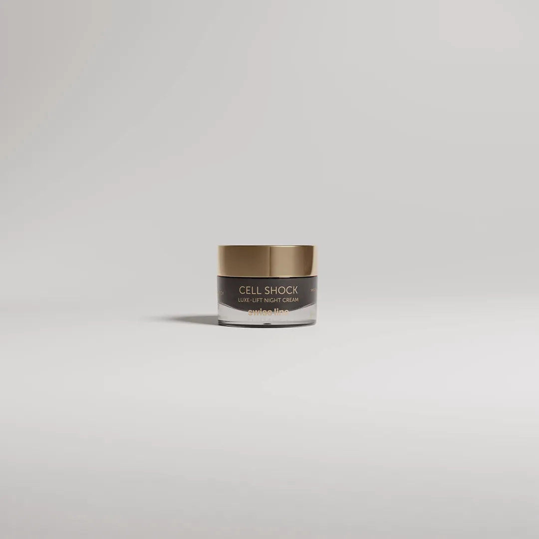 Skincare jar labeled 'Cell Shock' on a light gray background