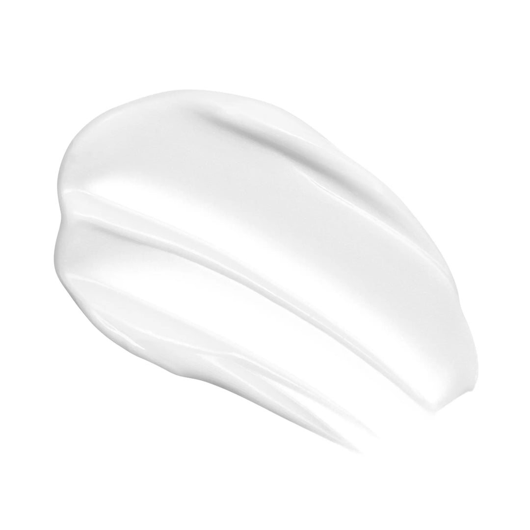 A thick, creamy white product swatch, likely a cosmetic cream or gel, shown in a smooth, swirled texture on a solid white background.