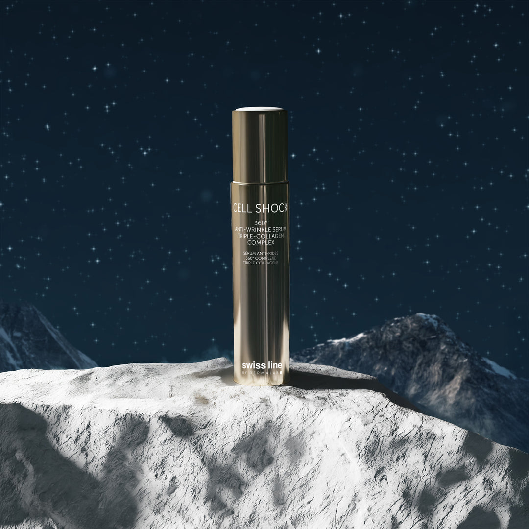 Bottle of swiss line Cell Shock on a snowy mountain background