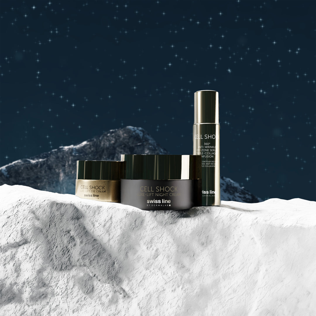Two skincare products with 'swiss line' branding against a mountainous night sky background.