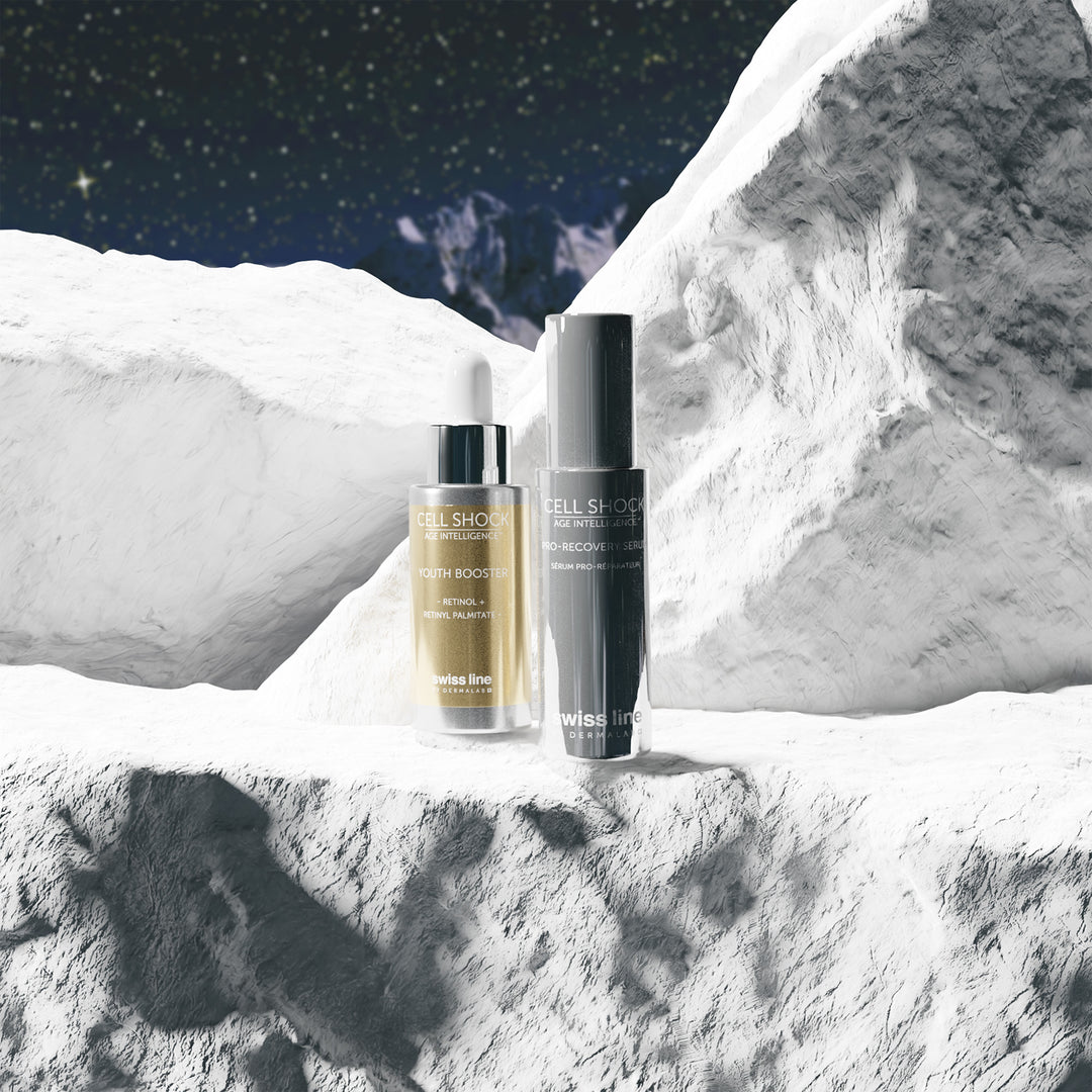 Two jars of swissline on a snowy mountain background