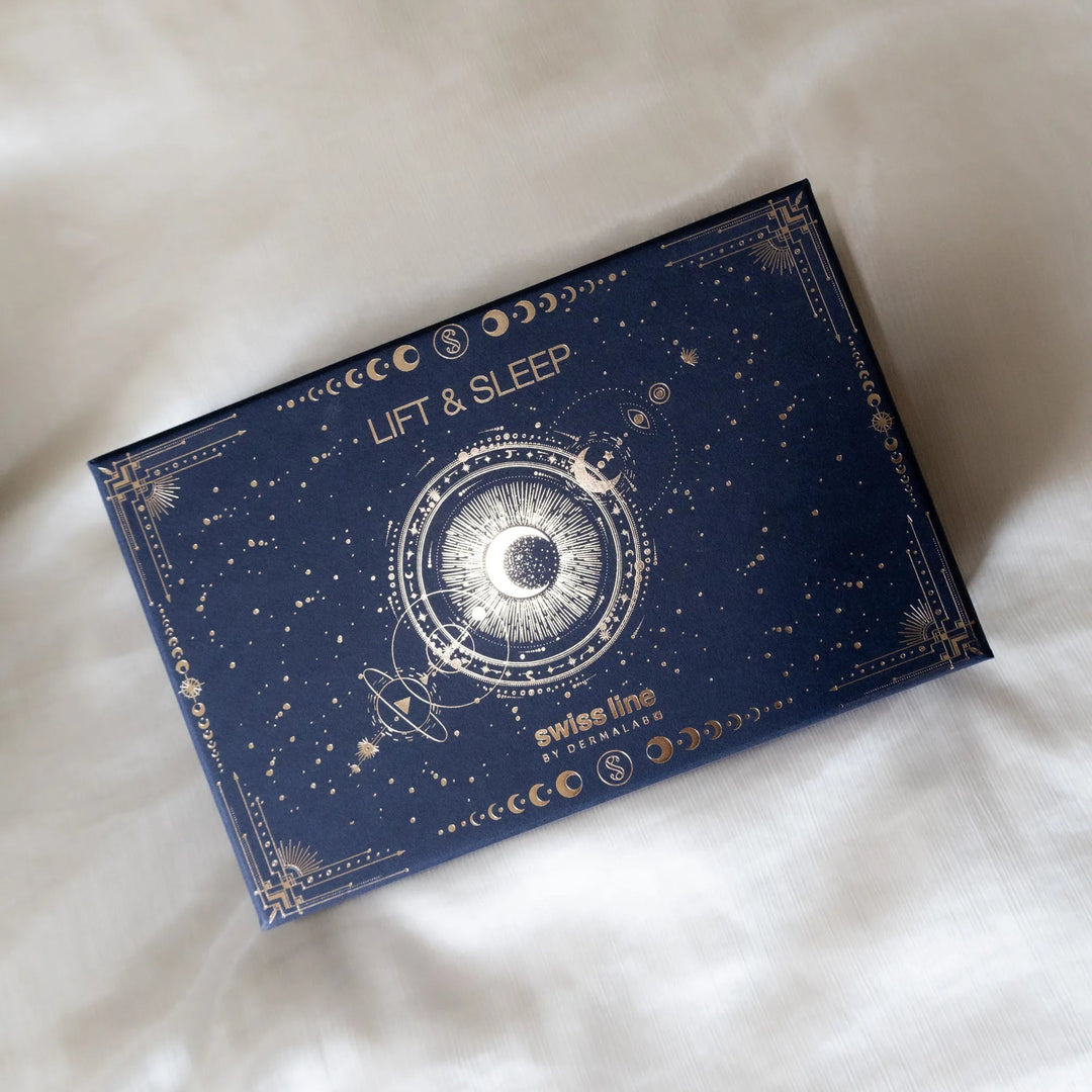 Blue box with starry design labeled 'Lift & Sleep' on a white fabric background
